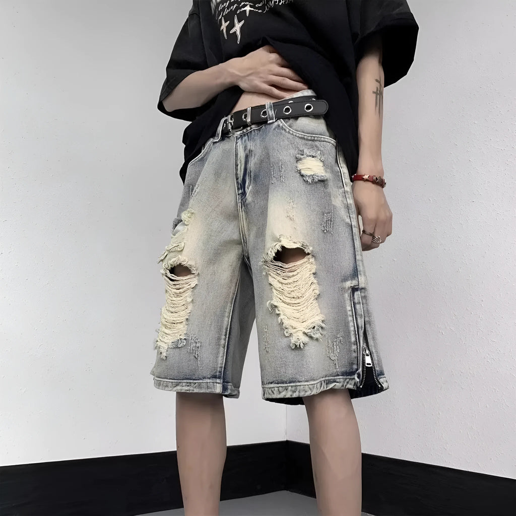 Blue retro-style women's denim shorts with a wide-leg loose fit and tattered detailing.