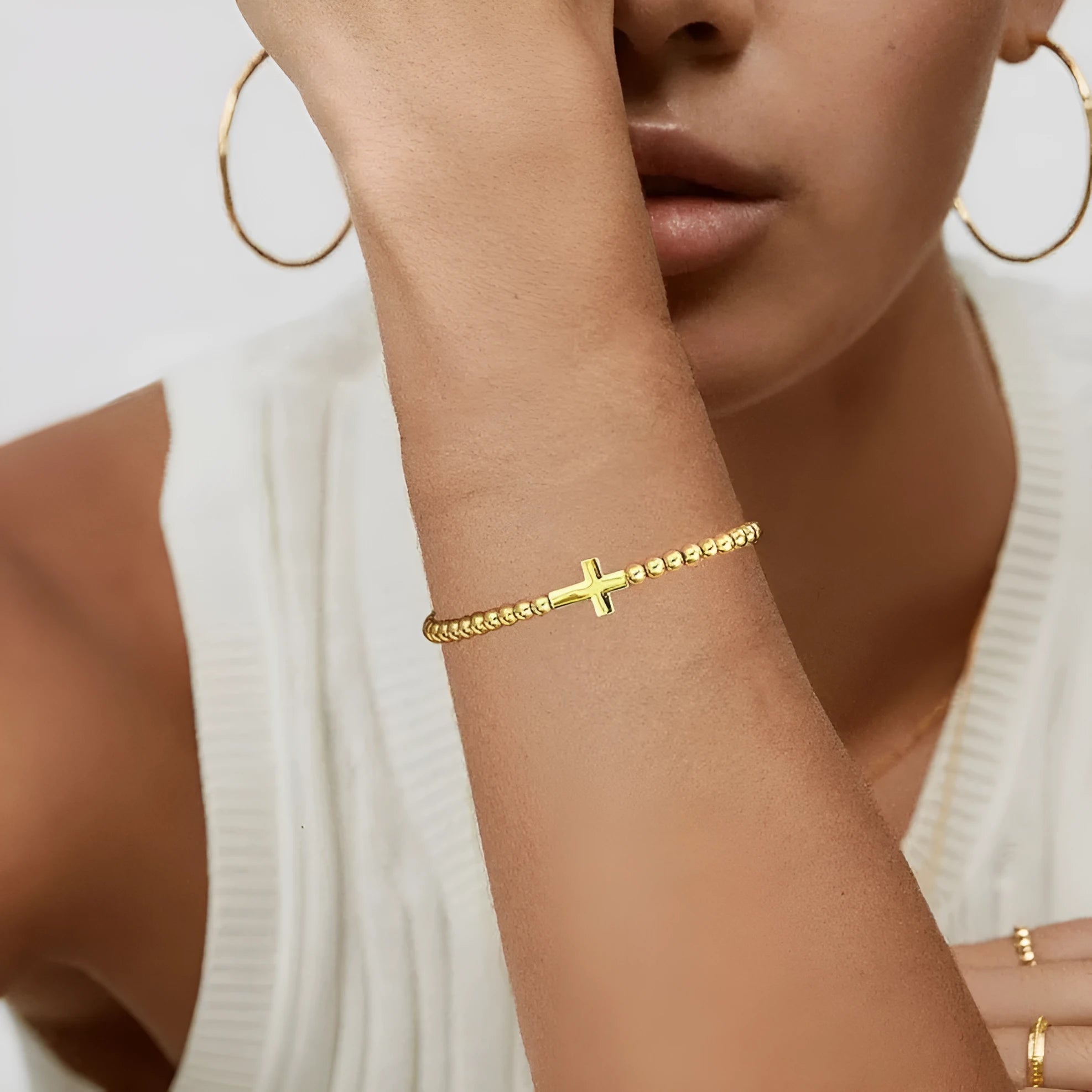 Simple geometric stainless steel adjustable beaded bracelet for women in an electroplated colour finish.