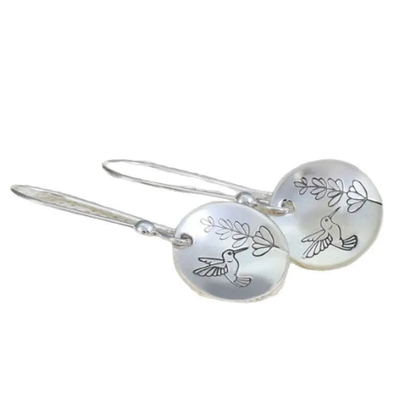 Silver-tone women's earrings with bird and leaf motifs in glossy round retro design