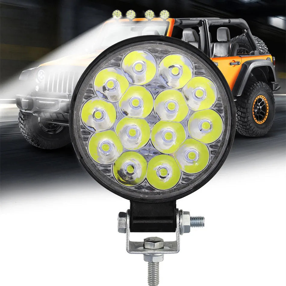White mini round LED work light with aluminium housing for vehicle and machinery applications