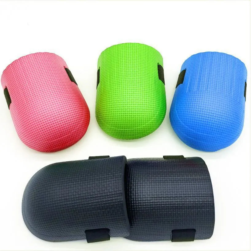 A pair of thick EVA foam kneepads in blue colour, for use on hard floors during auto repair or construction work.