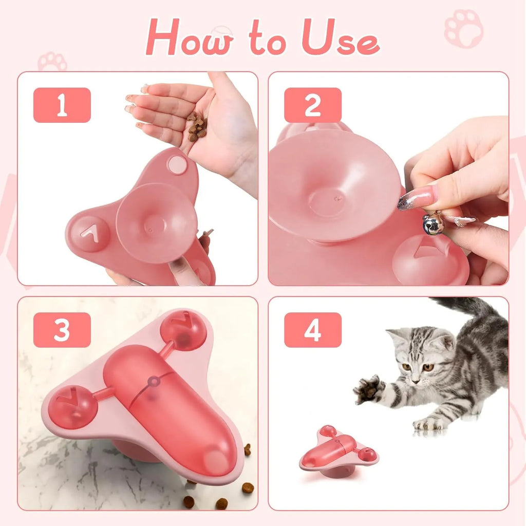 Interactive pet puzzle toy with blue snack cabin, bell, and catnip pouch attached with suction cups.