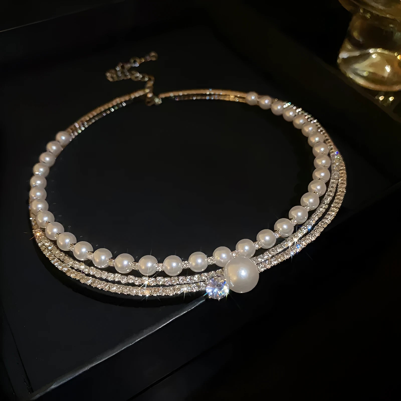 Round curved silver alloy clavicle necklace for women on a model.