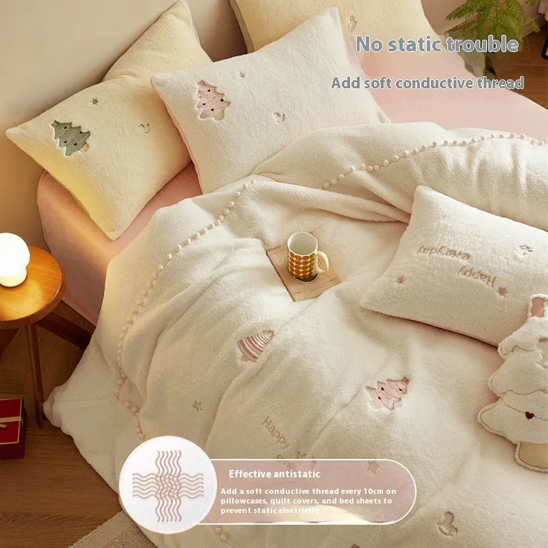 Milk fibre four-piece bedding set with green Christmas tree pattern on bed
