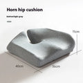 Memory foam office chair cushion with waist support in grey colour on wooden chair