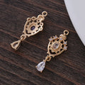 Water drop pendant with micro-inlaid zircon detailing on hollow crown setting in five colours