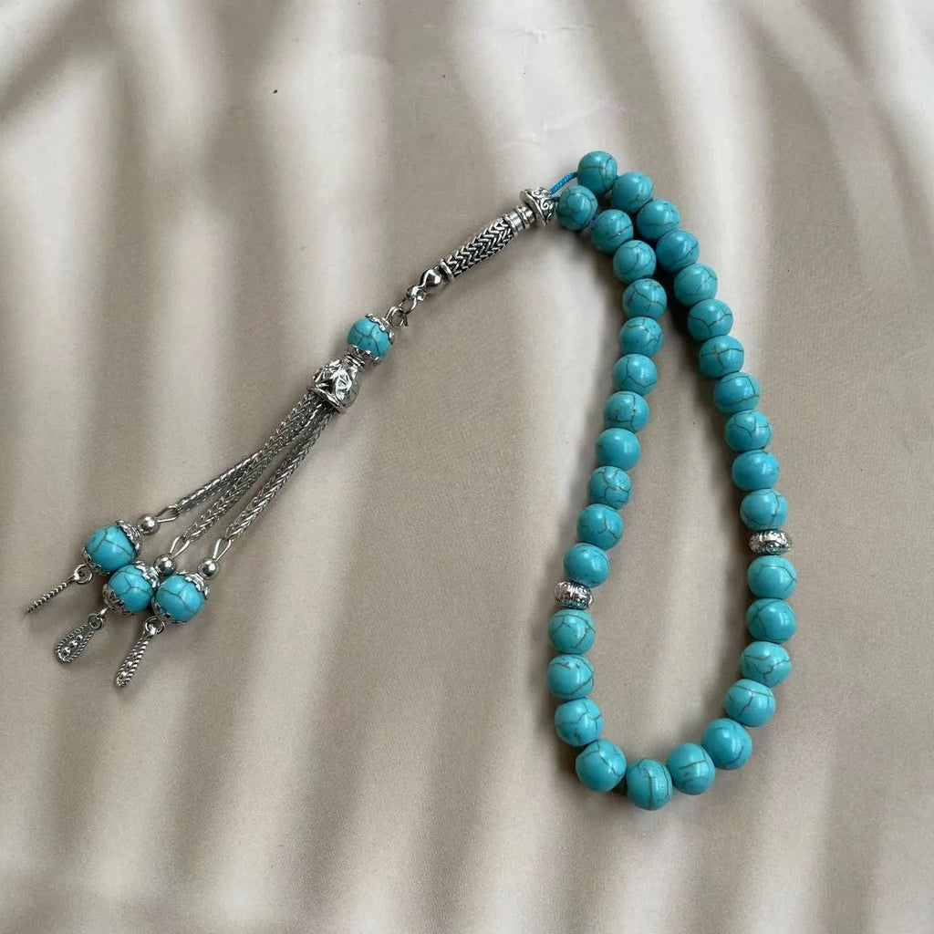 Handmade Muslim daily worship bracelet with 8mm sky blue stone beads on wrist