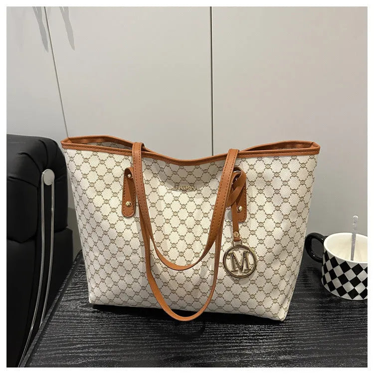 Street style shoulder bag in PU material with contrast stitching, shown in multiple colour options