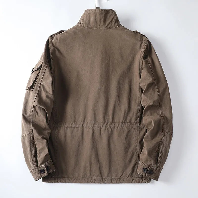 Men's loose fit cotton twill jacket in light army green, shown with zip-up front.