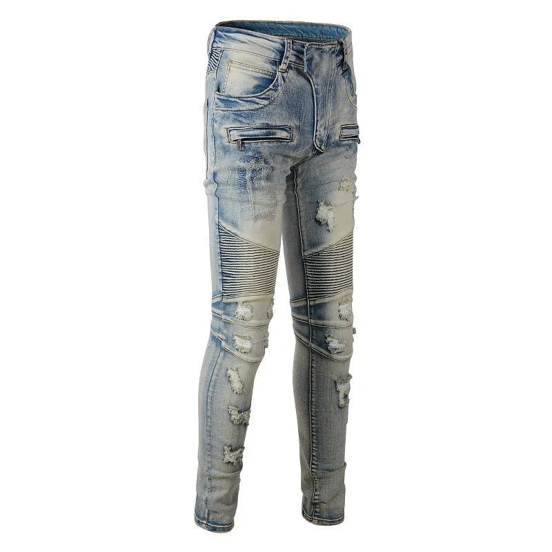 Men's light blue distressed slim fit jeans with hand-frayed details and straight leg opening