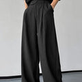 Men's black vertical striped pleated casual trousers with elastic waistband