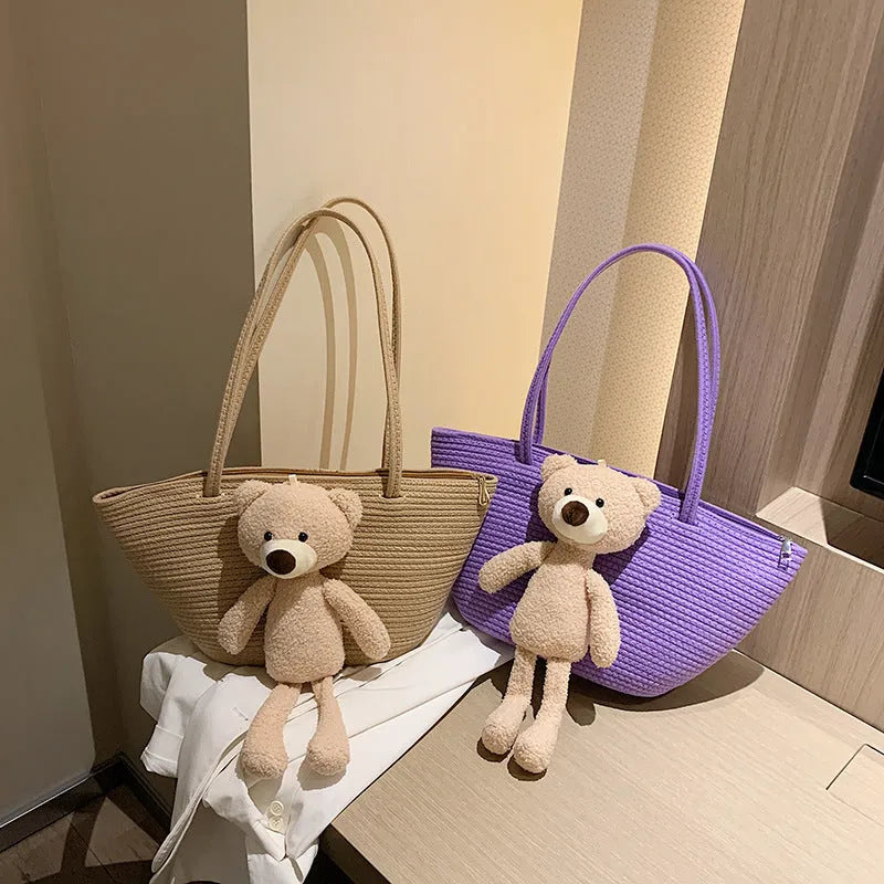 Woven cotton linen dumpling-shaped bag with three-dimensional pocket in khaki colour