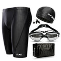 Men's black polyester swimming set with trunks, anti-fog goggles, cap, ear plugs, nose clip, and carrying bag
