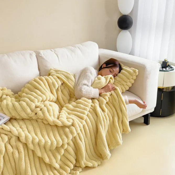 Solid colour double-sided faux rabbit fur bubble velvet blanket folded to show texture.
