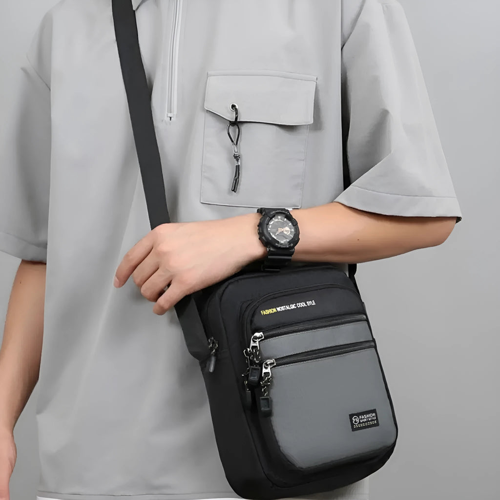Men's waterproof nylon crossbody bag in green colour with shoulder strap and storage compartments