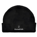 Black acrylic knitted hat with letter embroidery, round top, one size, on a plain background