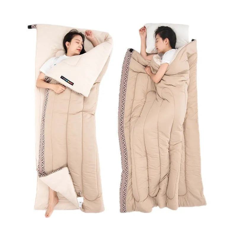 Four seasons portable camping sleeping bag in swamp colour with storage bag.