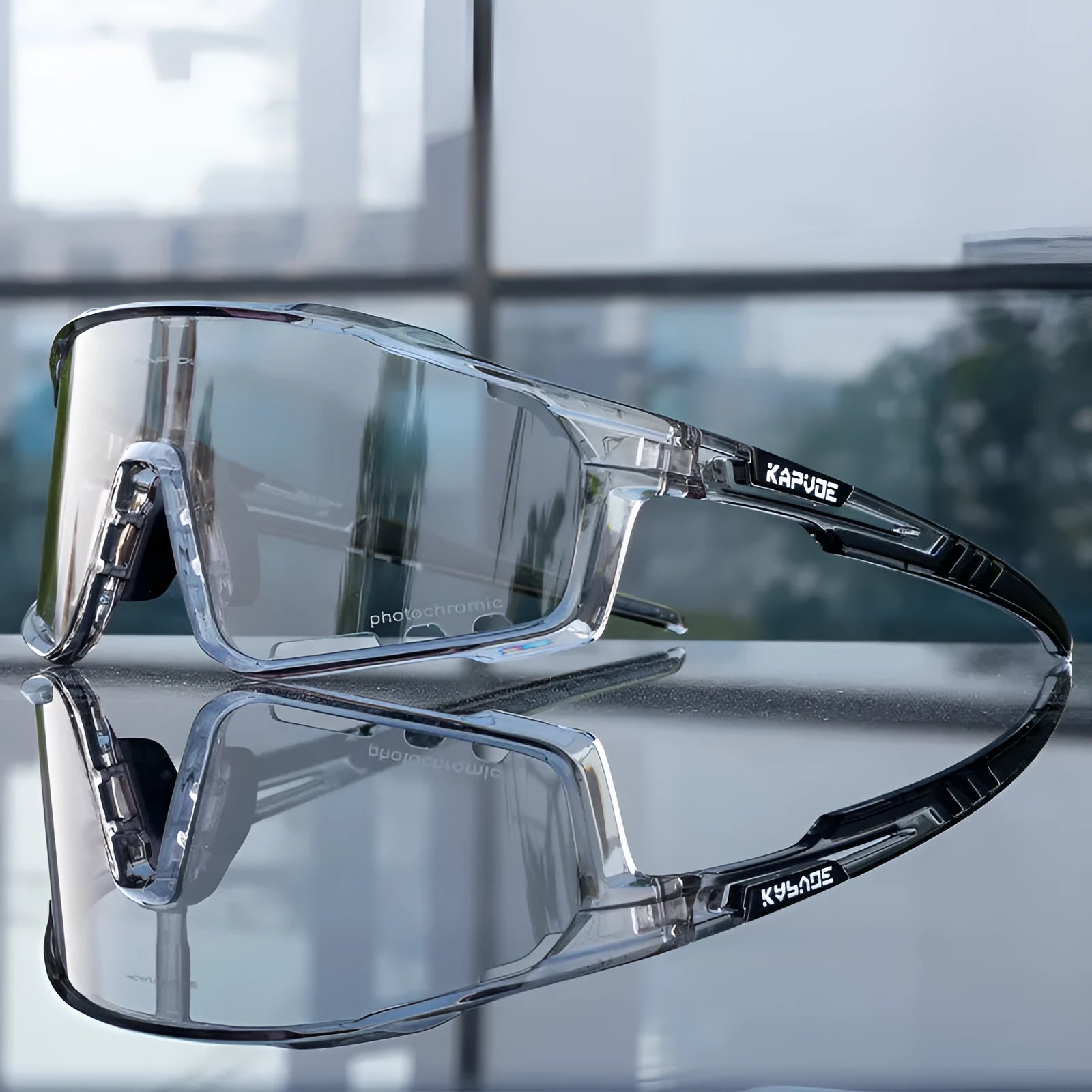 Photochromic cycling sunglasses with TR90 semi-rimless frame on a bicycle handlebar.