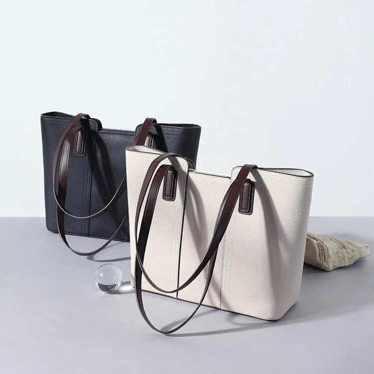 Women's genuine leather shoulder bag in box-type shape, shown in a choice of colours including khaki and black.