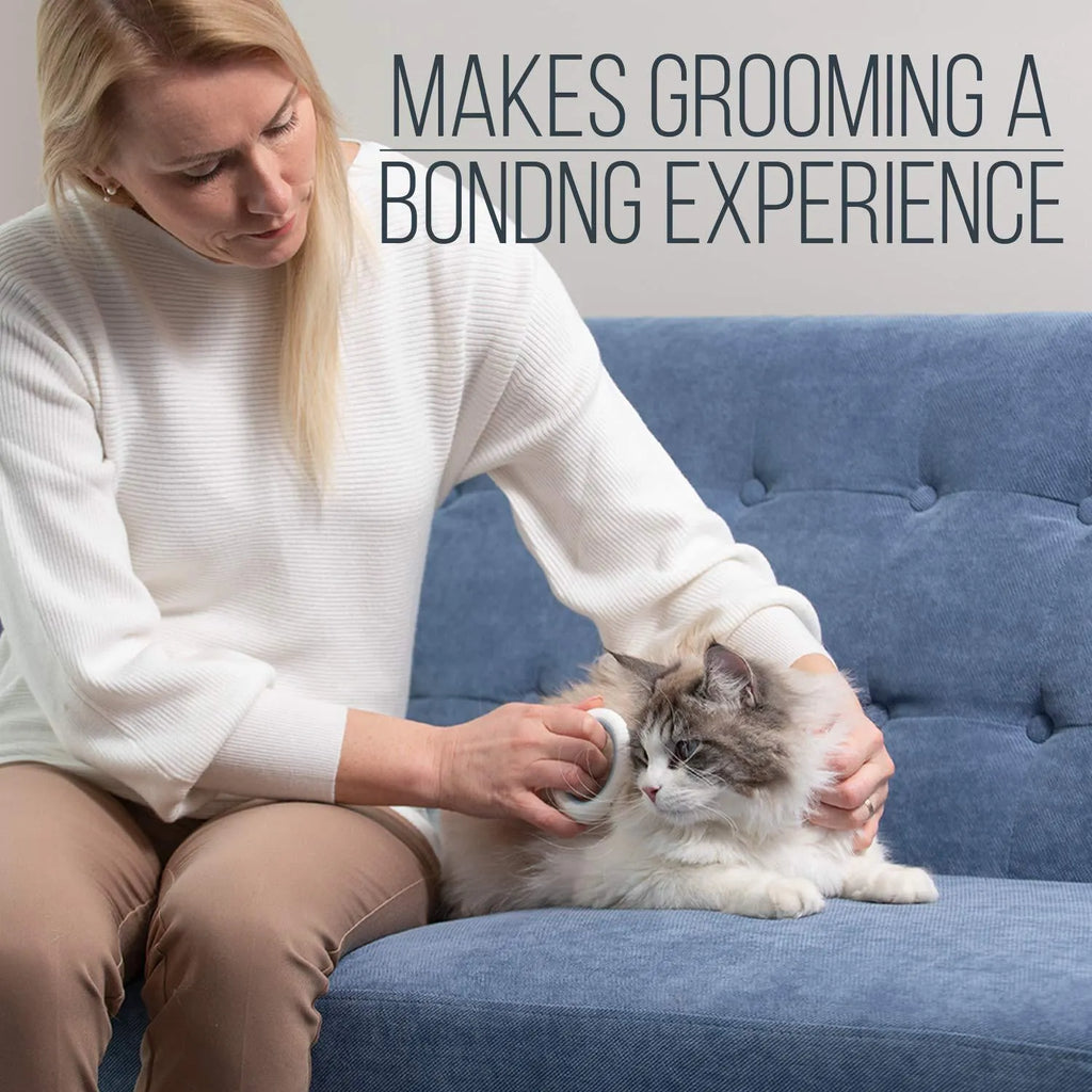 Blue pet grooming comb with soft teeth and ergonomic handle for deshedding cats and dogs.