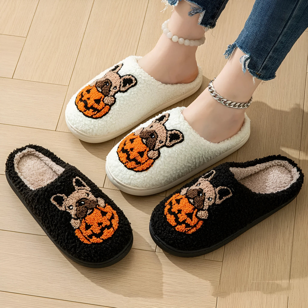 Black and white Halloween pumpkin slippers with plush upper and non-slip TPR soles