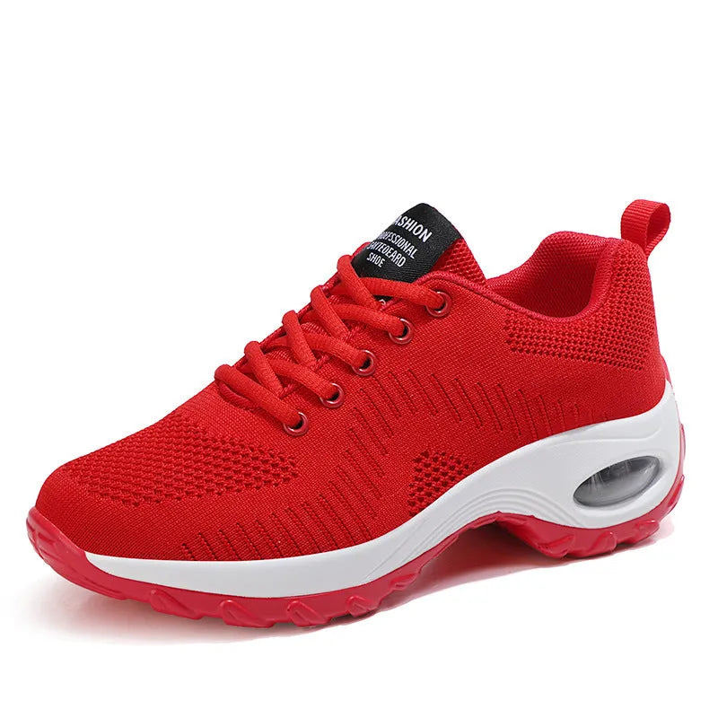 Women's red mesh sneakers with round toe and lace-up front, showing 3-5cm mid heel height