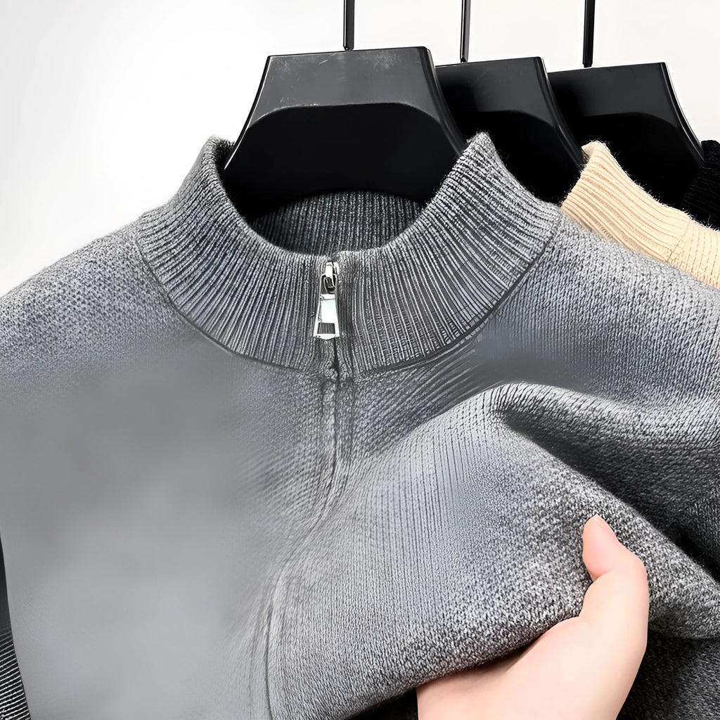 Men's grey knitted zip-up cardigan with high stand collar on hanger