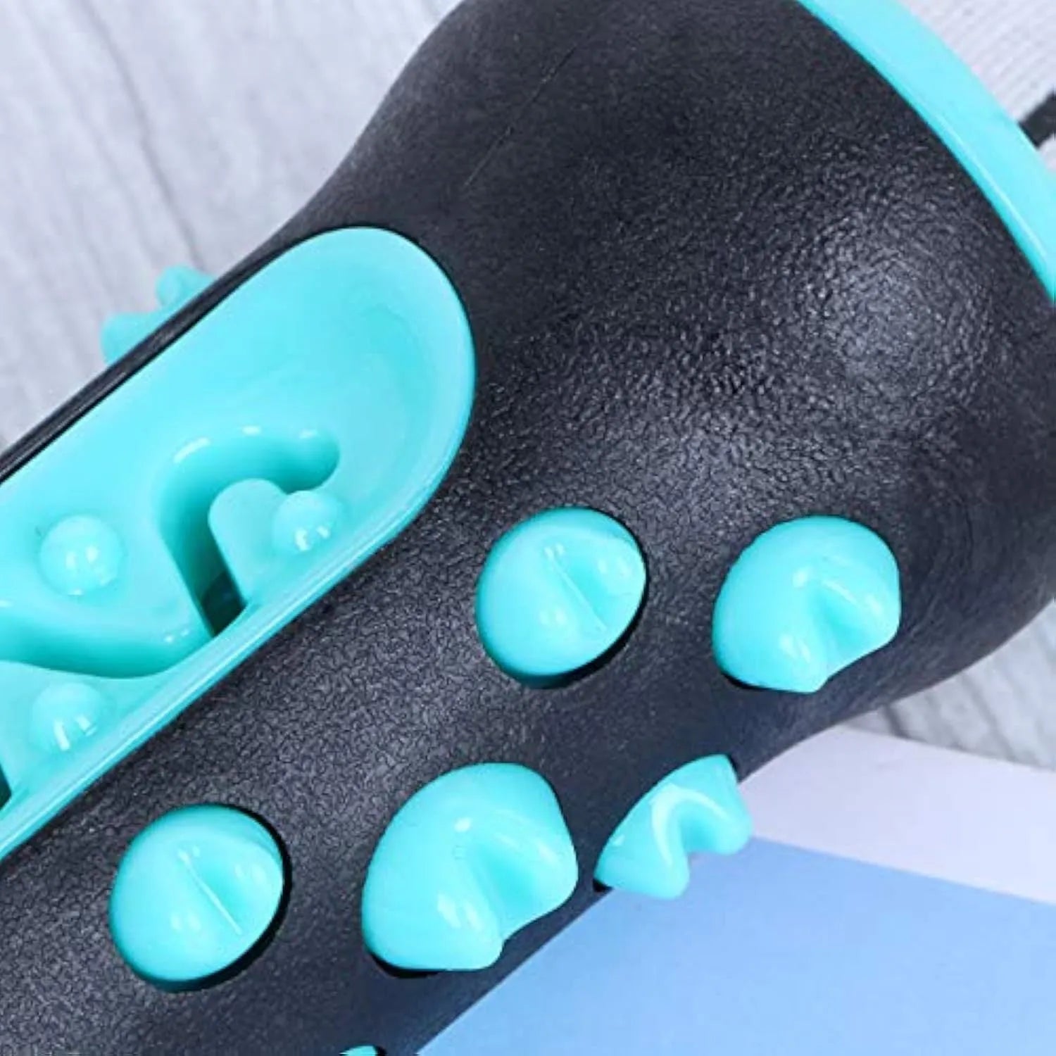 Natural rubber dog toothbrush chew toy in blue colour for dental cleaning.