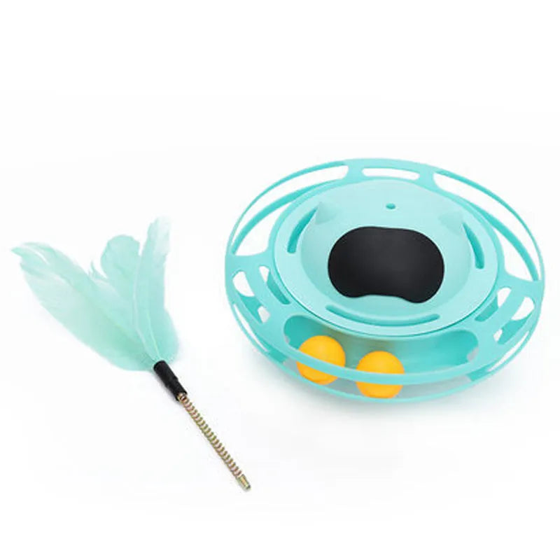 Pink plastic cat tumbler turntable stick toy with feather attachments on a white background.