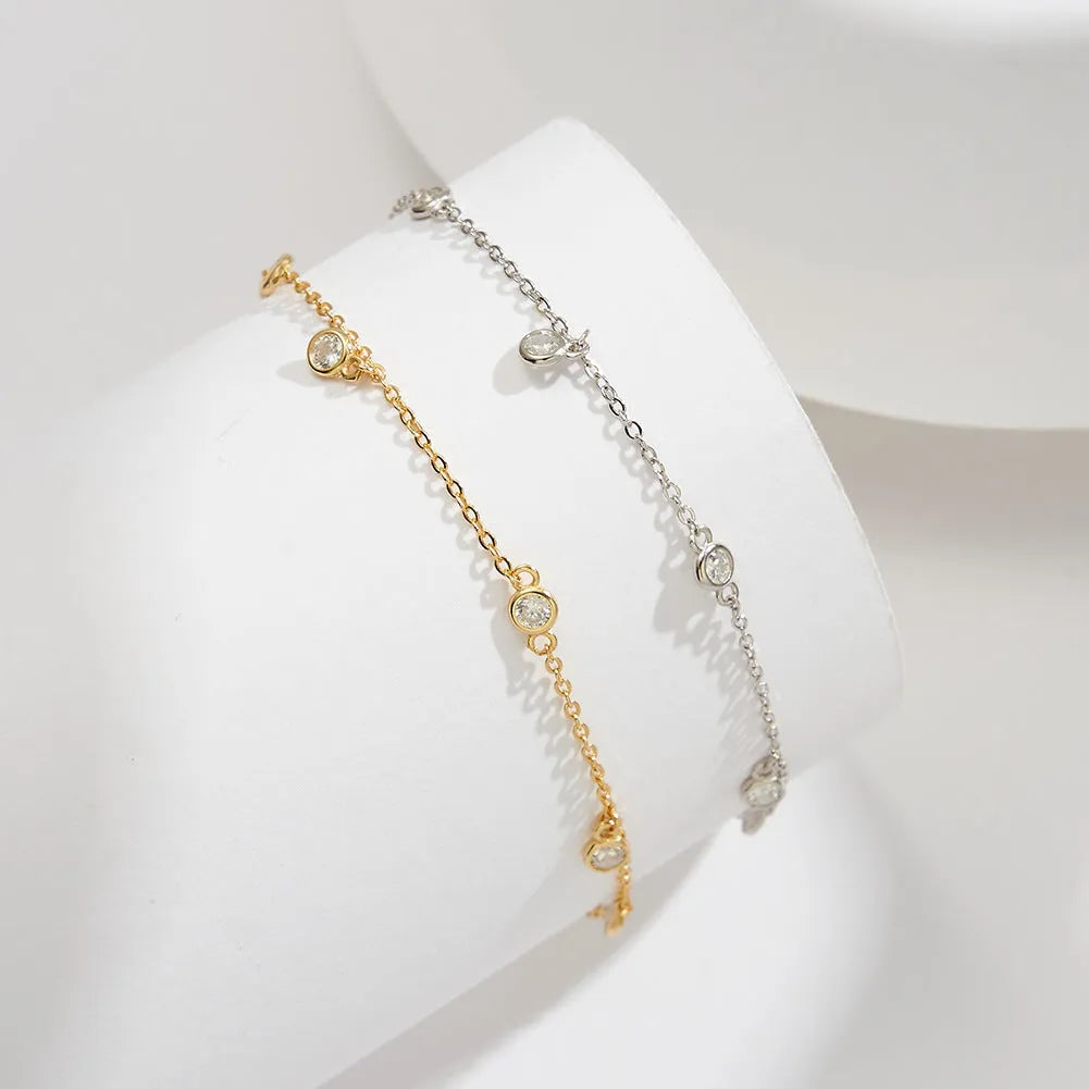 Women's silver anklet with geometric zirconium pendant in gold or platinum finish on adjustable chain