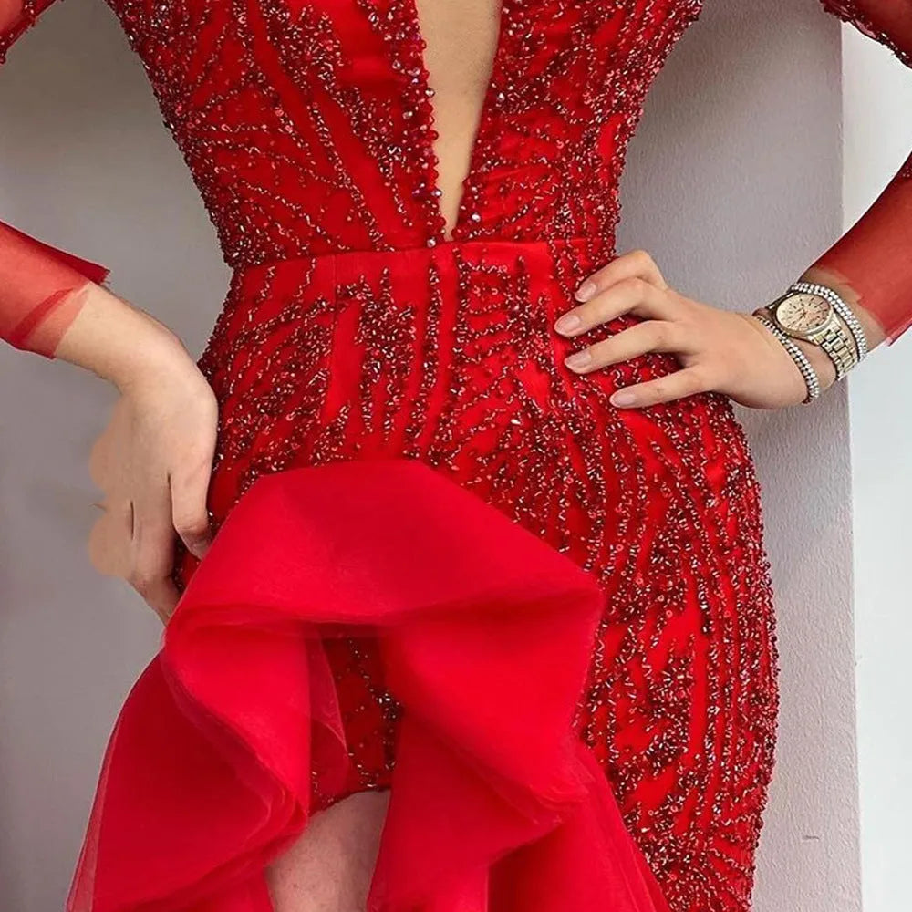Red deep V sequined fishtail dress with princess sleeves on female model