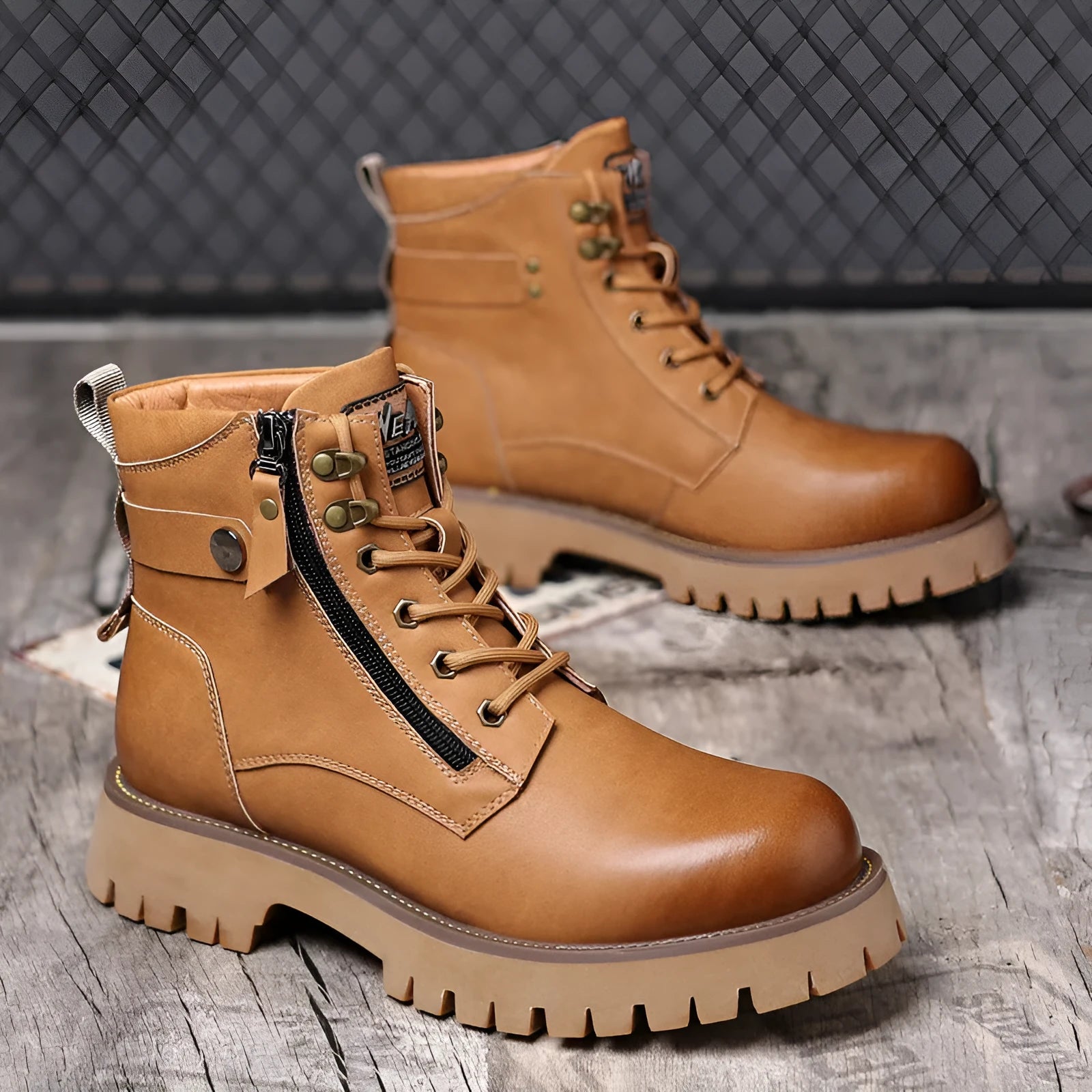 Men's brown leather high-top boots with side zip, thermal lining, and rubber sole