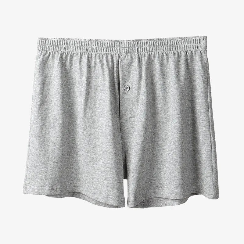 Men's high-waist loose fit cotton boxer shorts in black, shown flat.