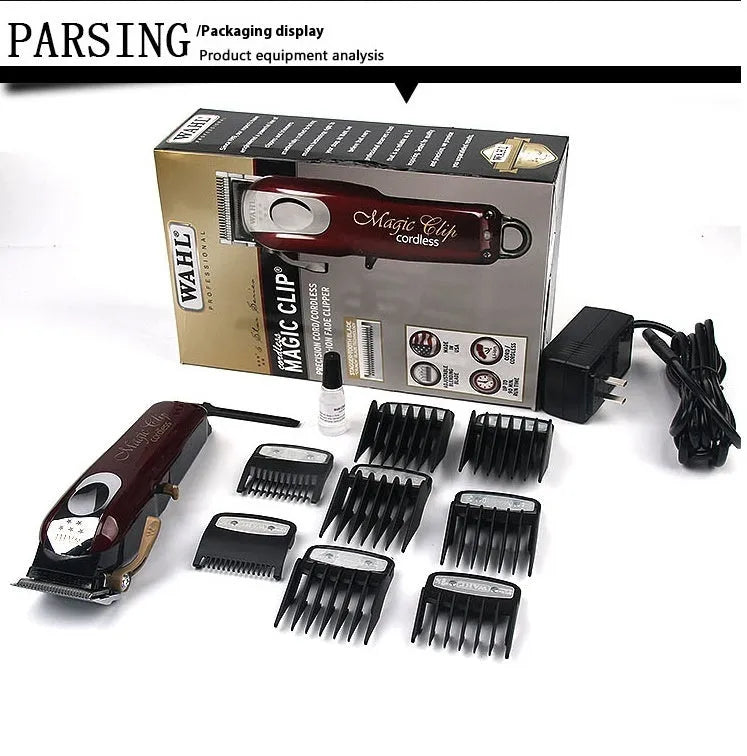 Charging hair clippers set with multiple plug adapters on a table.