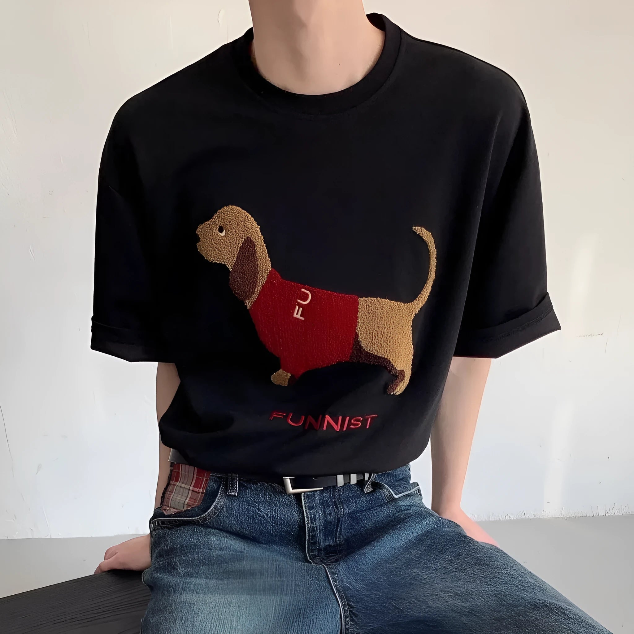 Men's grey cotton T-shirt with embroidered sausage dog holding towel design on front
