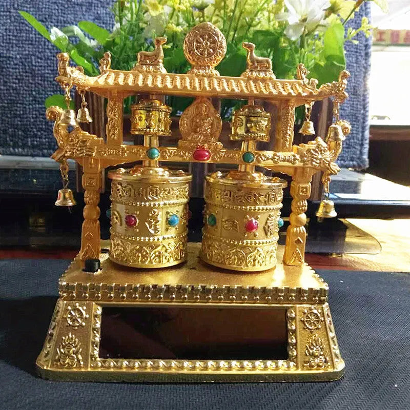 Traditional Chinese electric alloy prayer wheel car decoration measuring 12x15x8cm