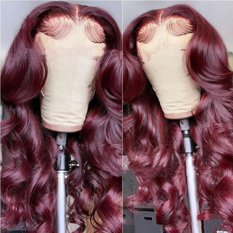 Front lace synthetic wig in wine red long curly style with long bangs on a mannequin head