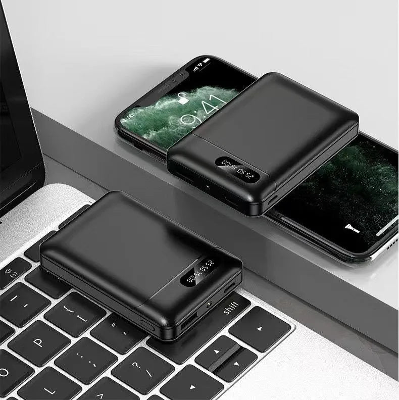Black and white 10000 mAh portable power bank showing USB ports and dimensions
