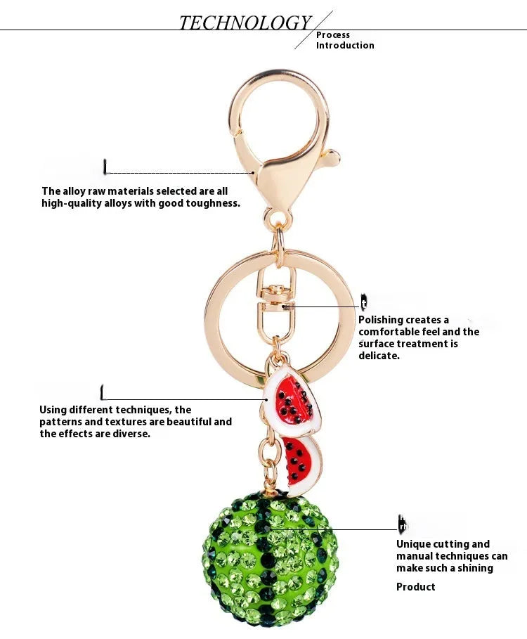 Green watermelon-shaped zinc alloy keychain measuring 12 centimetres