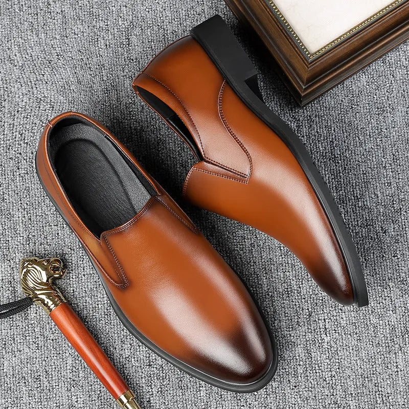 Men's black renewable leather business casual slip-on shoes with rubber sole and leather toe cap.