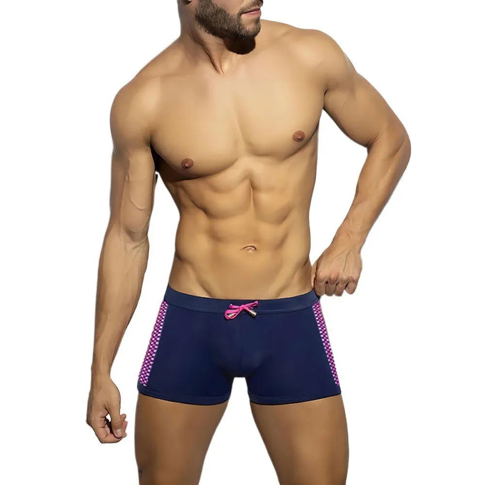 Polka dot print quick-dry swimming boxers in nylon, shown in available colours and sizes for sports.
