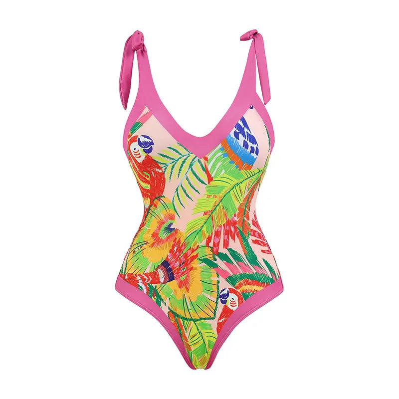 Retro pink floral print women's one-piece swimsuit with a V-neck, covered belly, and thin skirt.