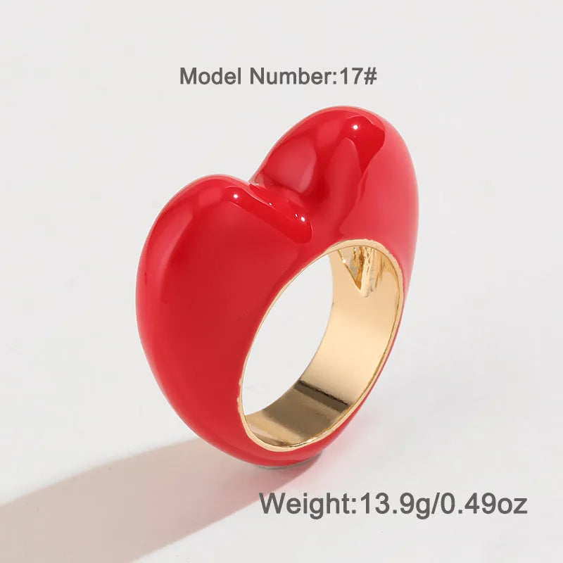 Close-up of a heart-shaped zinc alloy ring with three-dimensional pink enamel decoration.