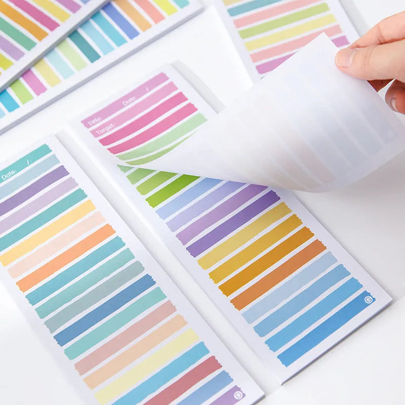 Cartoon plastic sticky note notepad showing colourful striped and bunny or bear character covers, size 90mm by 248mm