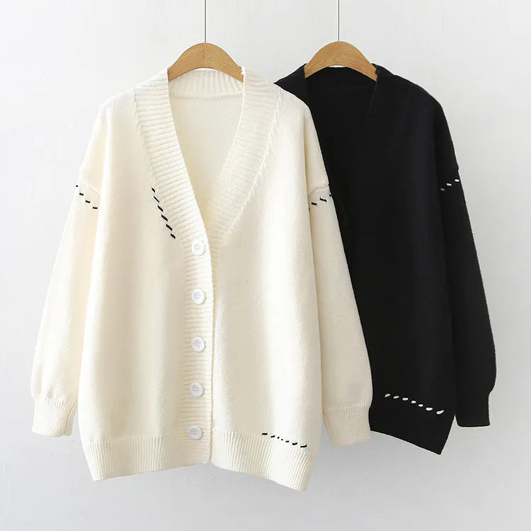 Women's loose black knitted cardigan coat with long sleeves