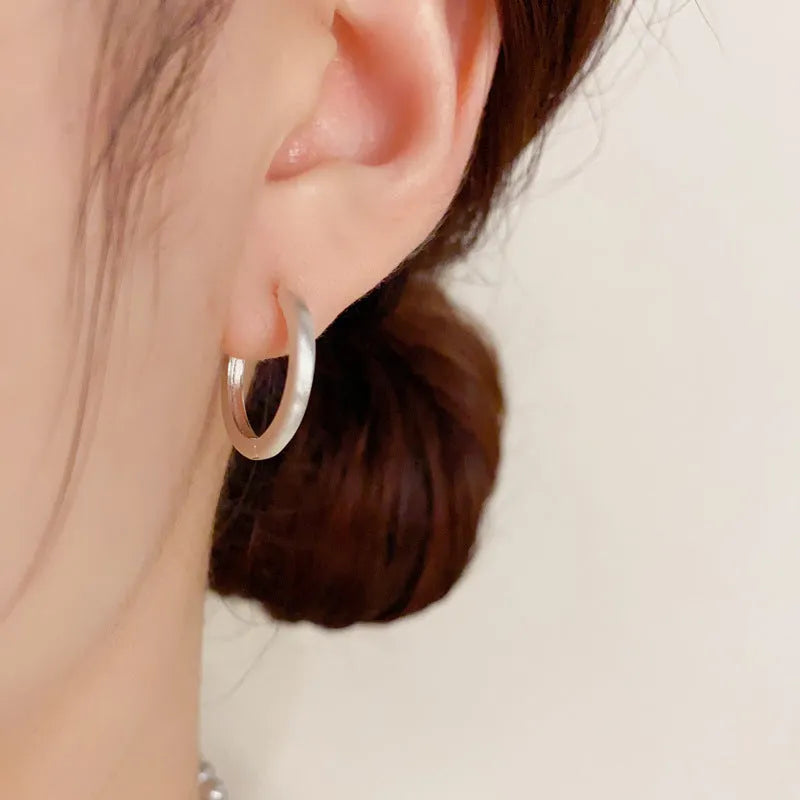 Copper geometric ear clips with gold plating in gold and silver colour options