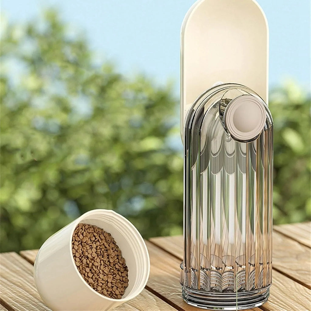 Beige and green foldable dog water bottle with food dispenser base for outdoor walking and travel.