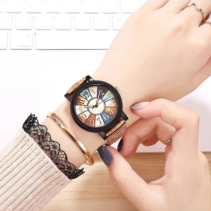 Casual women's wrist watch with leather strap showing 37mm round dial and stainless steel buckle