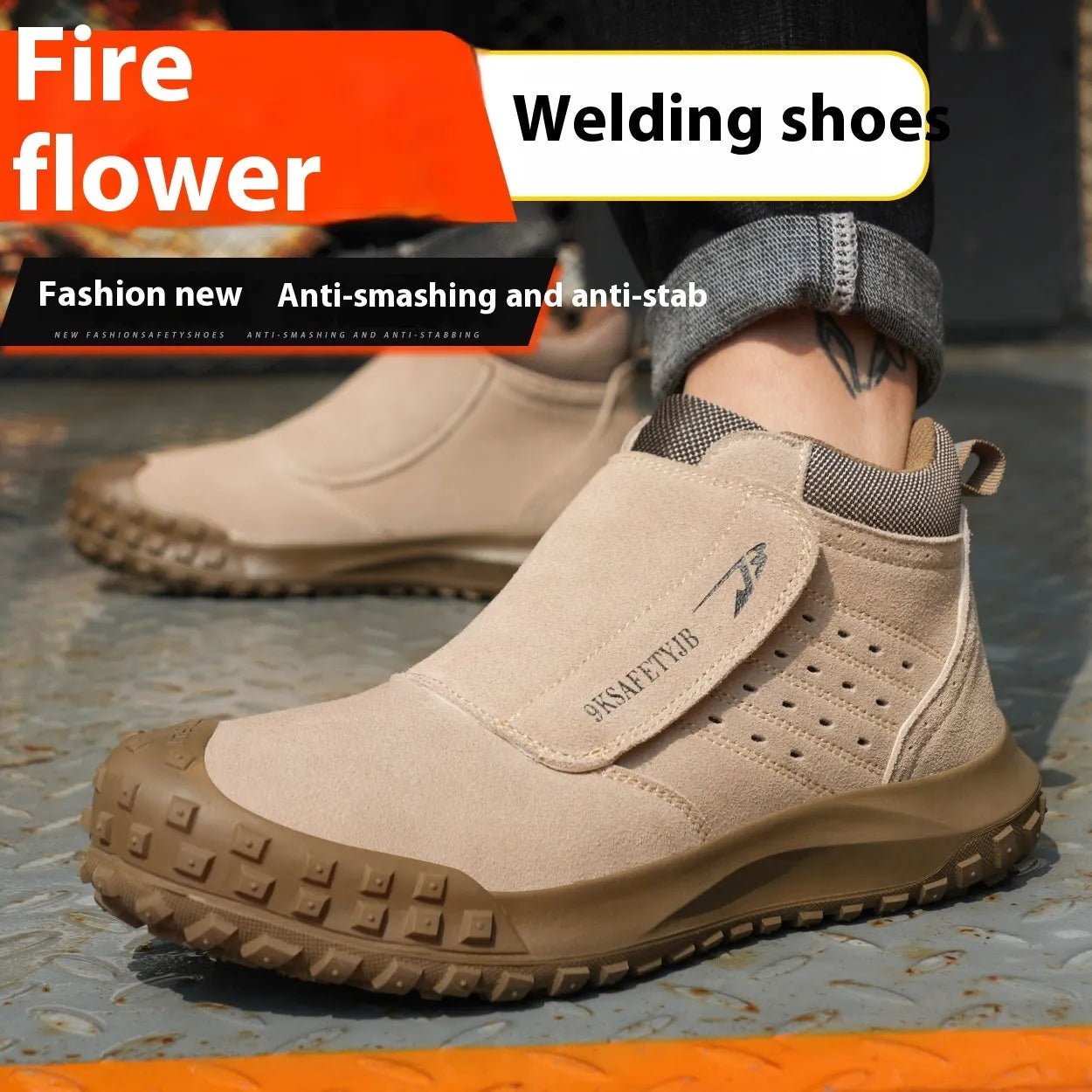 Lightweight grey welder safety shoe with steel toe cap and lace-up front on a worksite background.