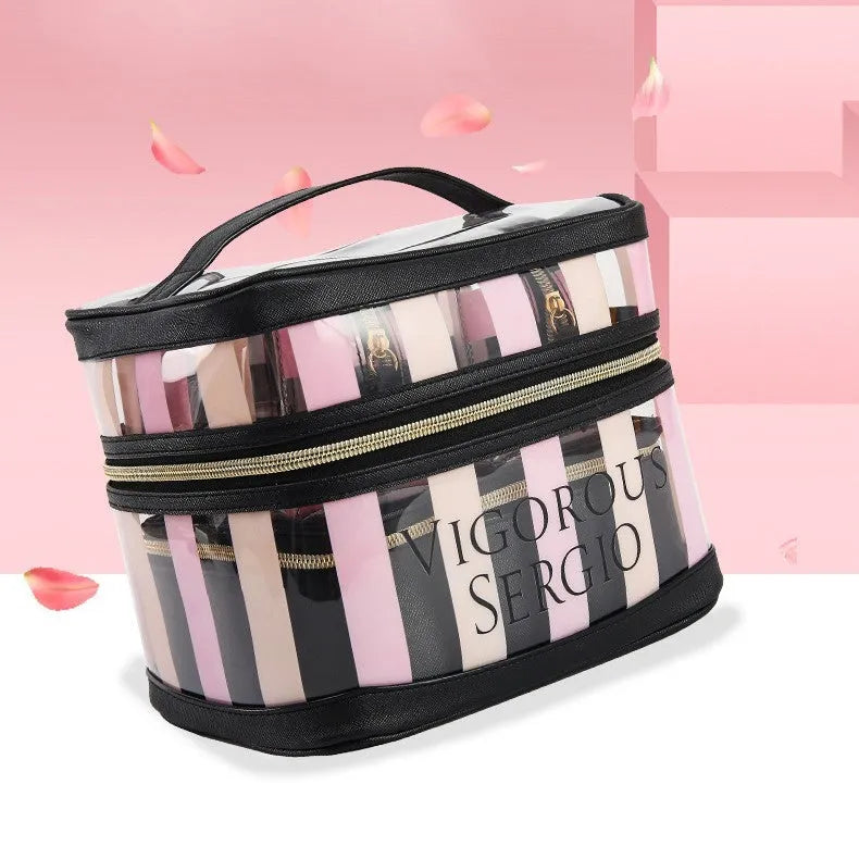 Pink and white striped folding makeup bag with floral pattern and synthetic leather material.